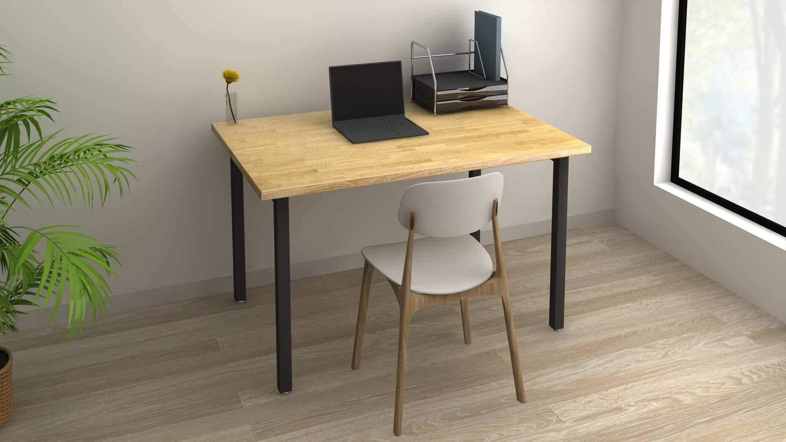 テーブルの前に椅子が一脚と、テーブル上にレターケースとノートパソコンが置いてある